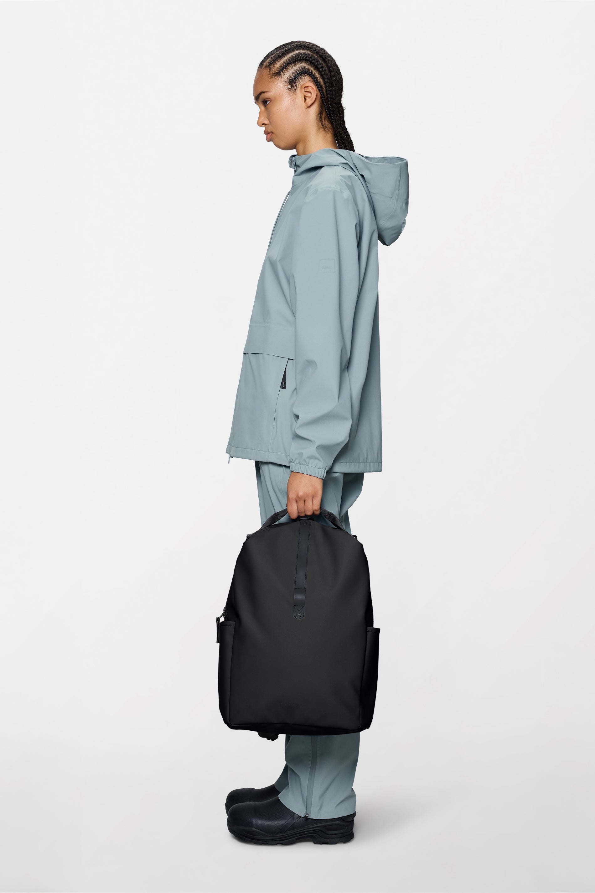 RAINS Clip Front Backpack Black 21L H44 x D16 x W30 cm Backpack