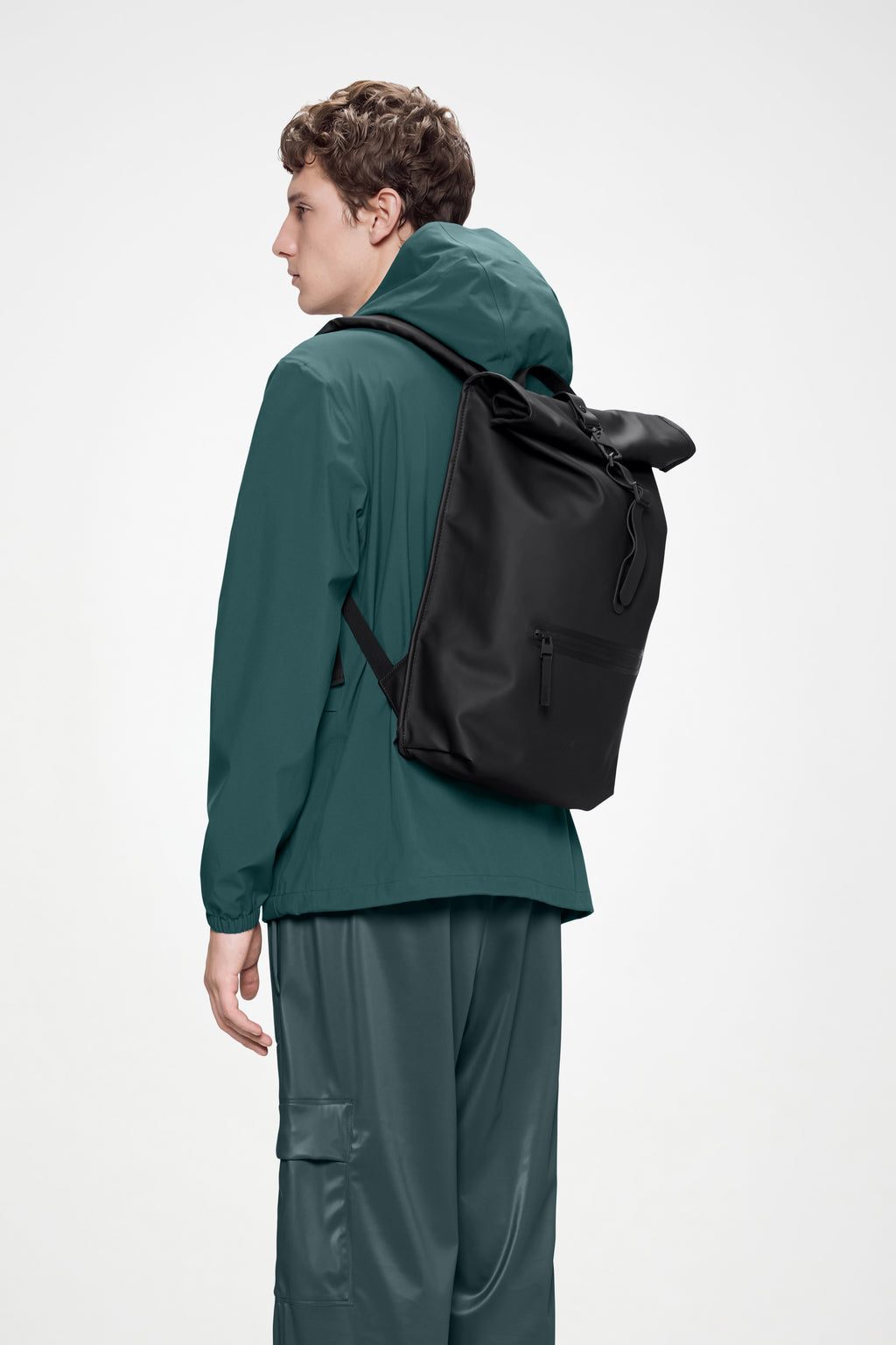 runner backpack rains x Umbro Transfer W3 'Black Trail Clip Front Backpack is cut from Rains signature PU fabric Rains Rolltop Rucksack in Black