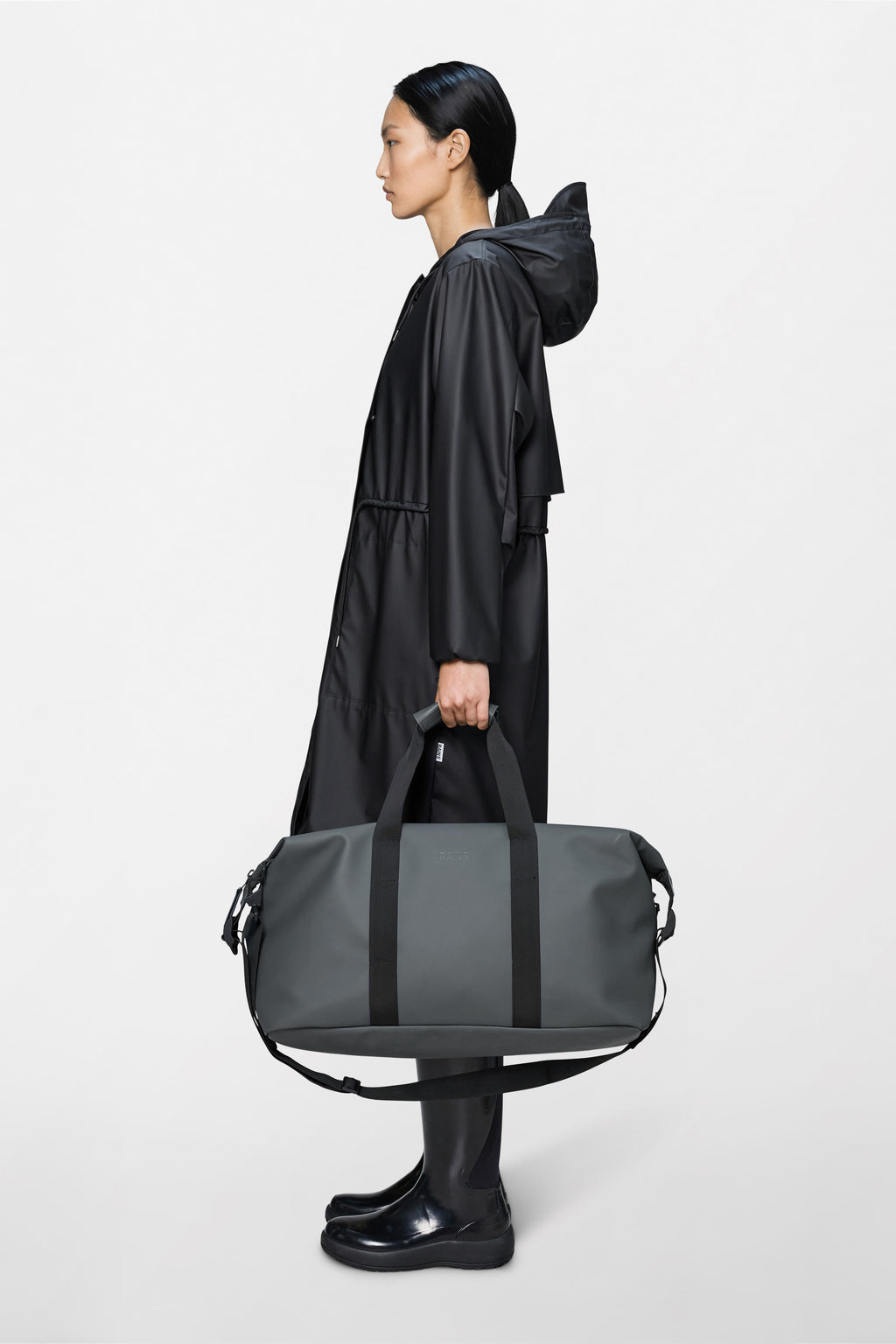 Rains® Hilo Weekend Bag in Black for $125