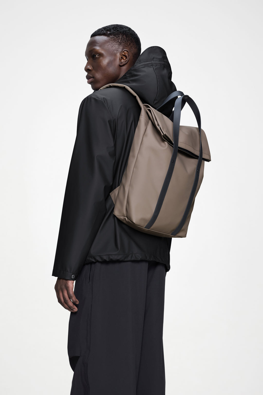 Rains® 2 Way Tote Backpack in Beige for $140