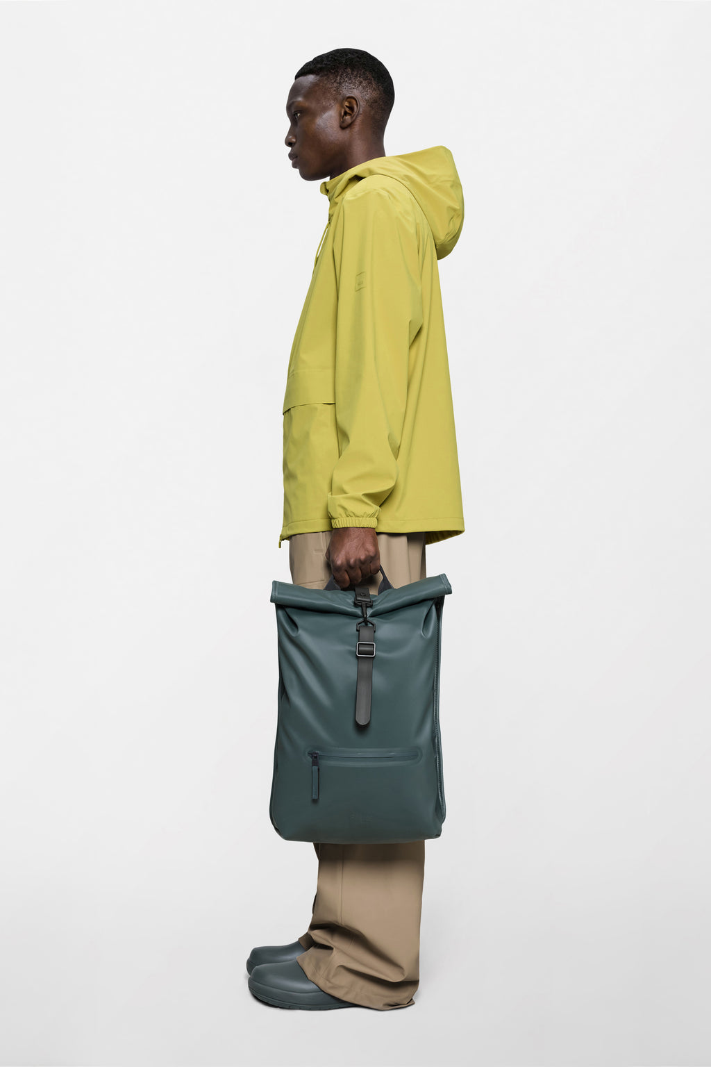 Rains® Rolltop Rucksack in Black for $150