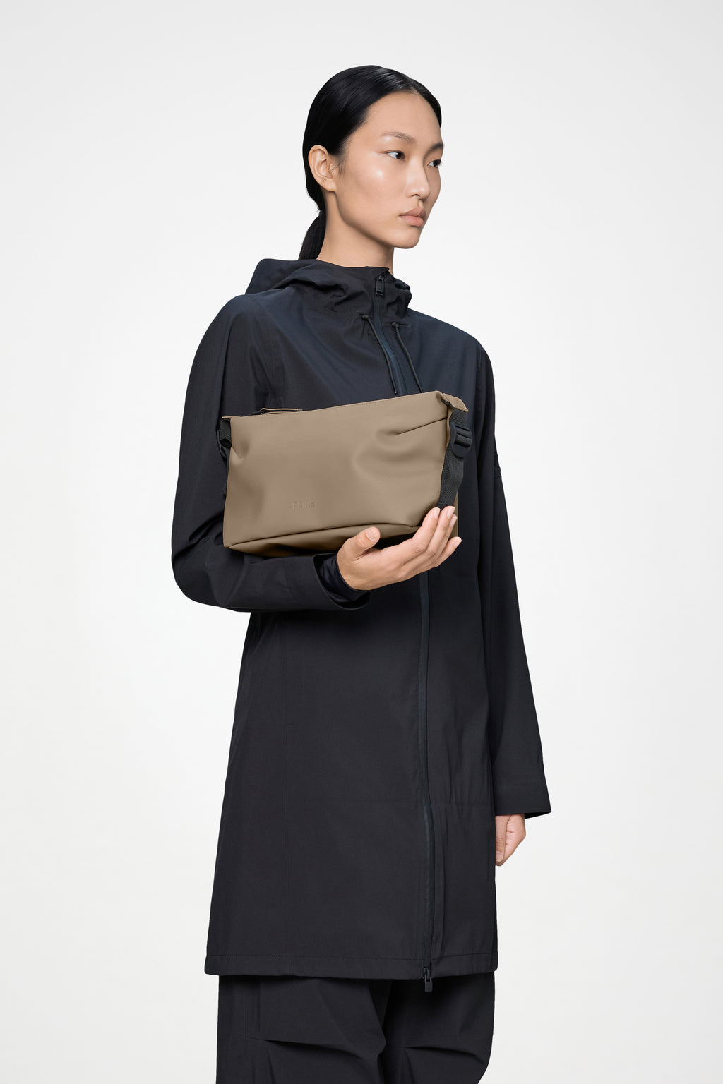 day bag rains Rains Texel Duffel in Black for $225 Design is cut from Rains signature waterproof PU fabric RAINS Hilo Weekend Bag