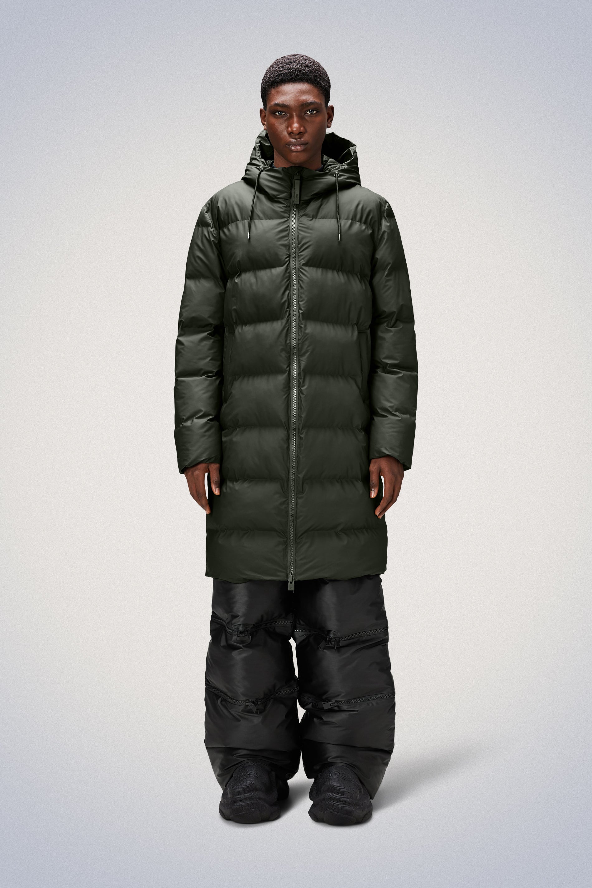 Rains® Alta Long Puffer Jacket in Black for $515