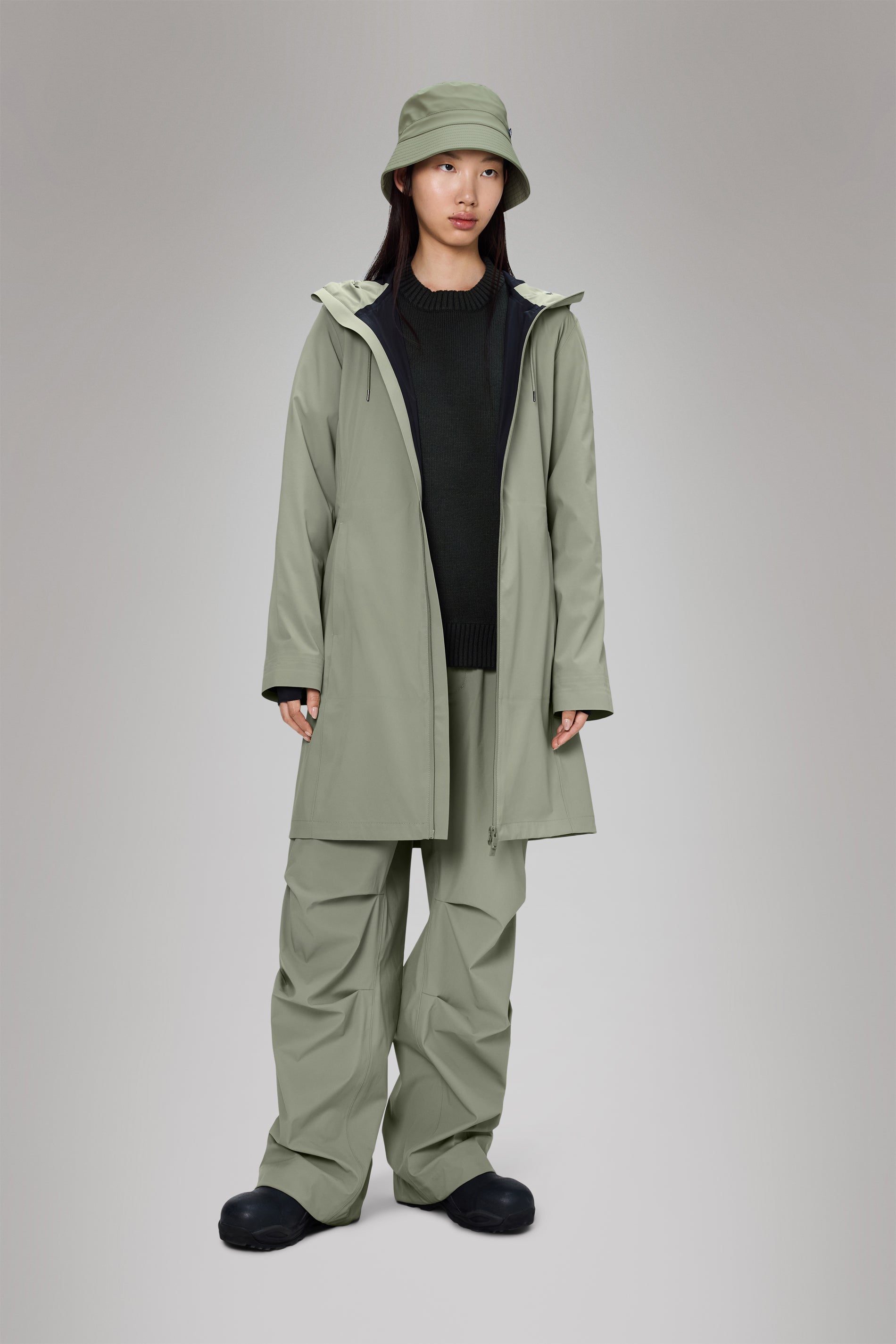 Rains® Suva Hardshell Long W Jacket in Black for $285 | Free