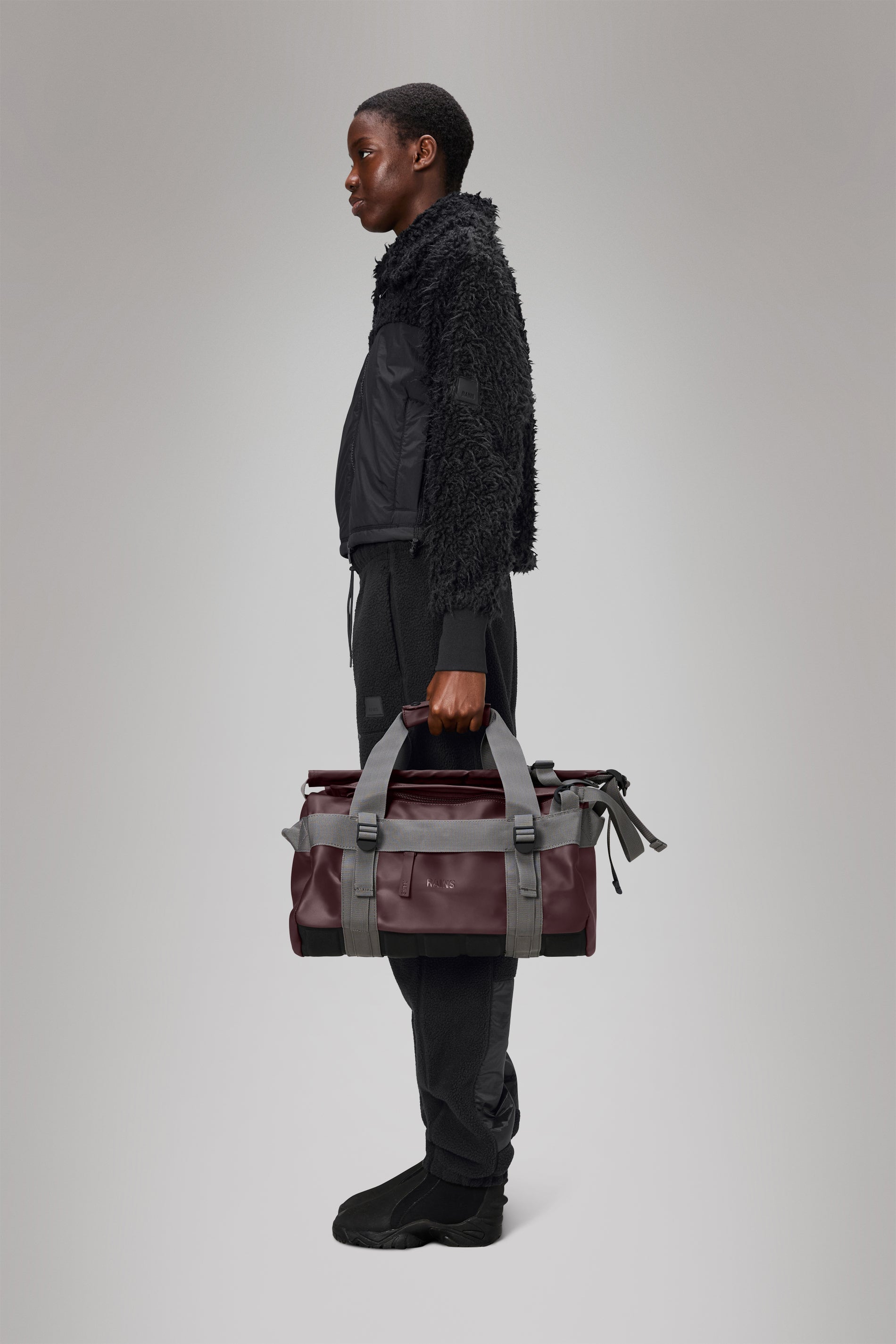 Rains® Texel Duffel Bag Mini in Black for $165 | Free Shipping