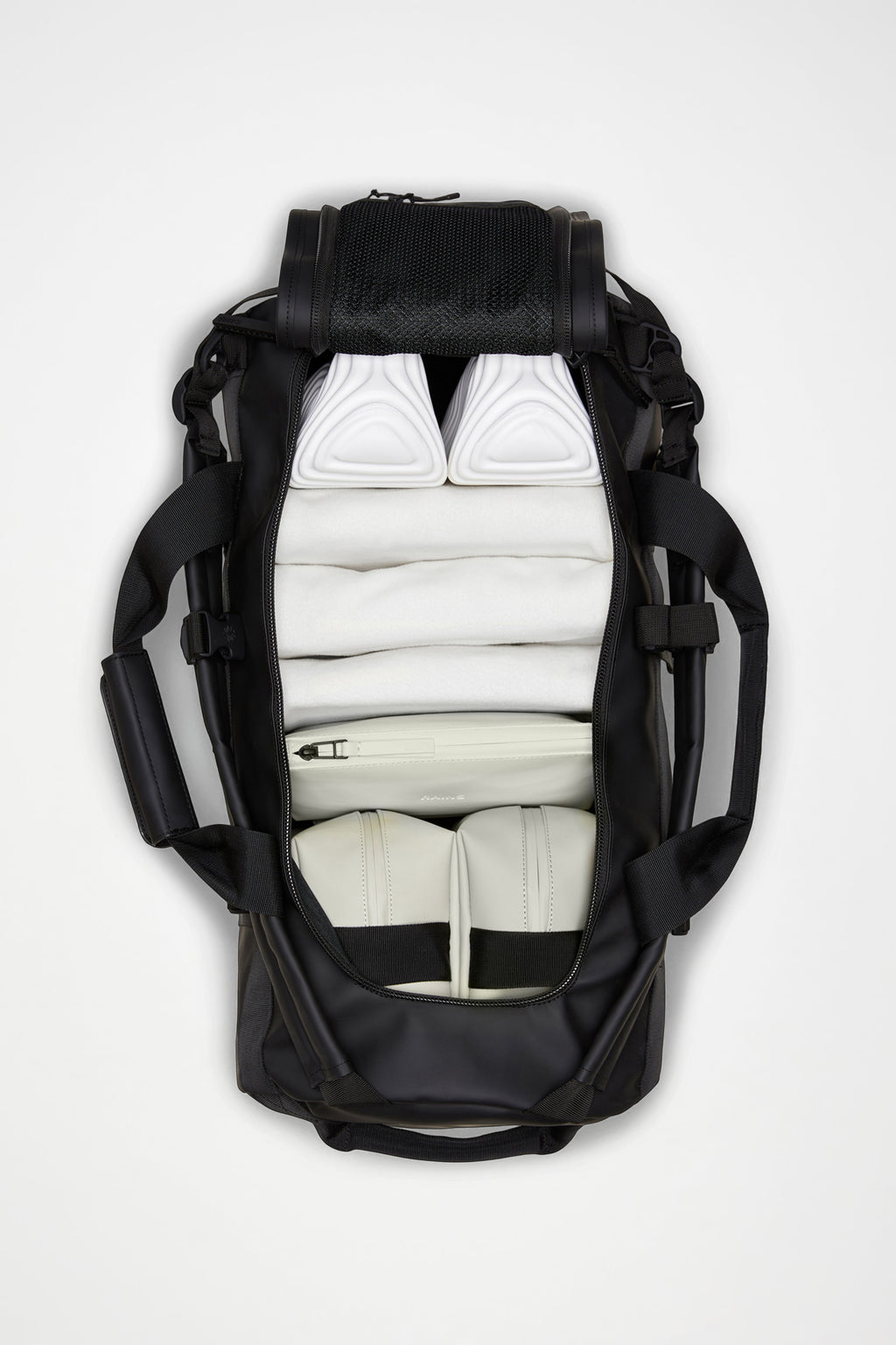 rains versatile duffel backpack Rains® Texel Duffel Bag in Black for $225